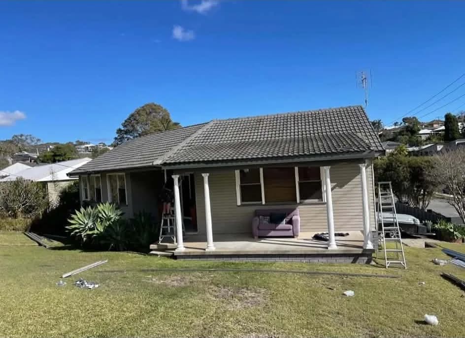 Tiled single-storey home before a tile to metal roof conversion